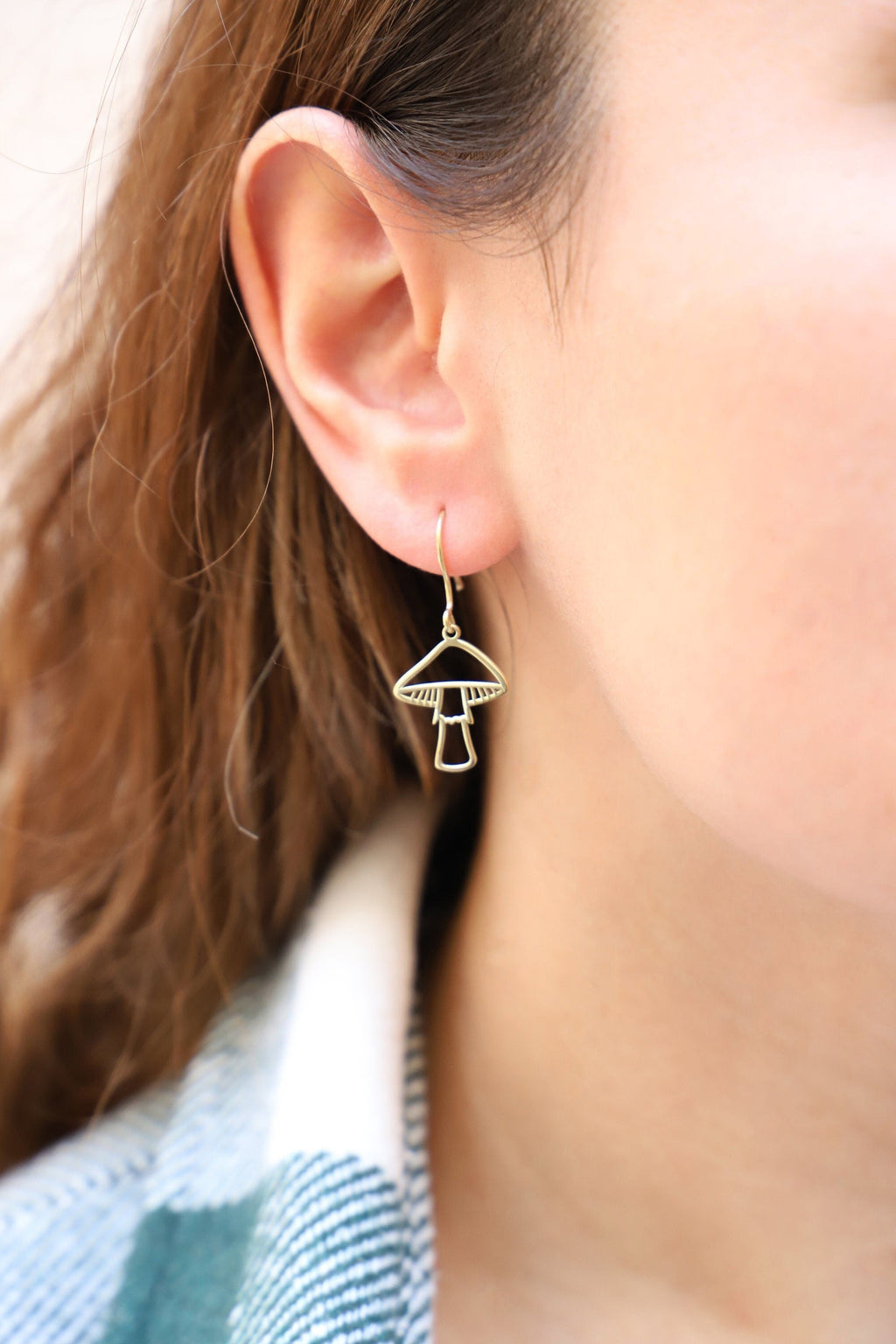 Gleaming Gold Dangle Earrings with Enchanting Mushroom Design