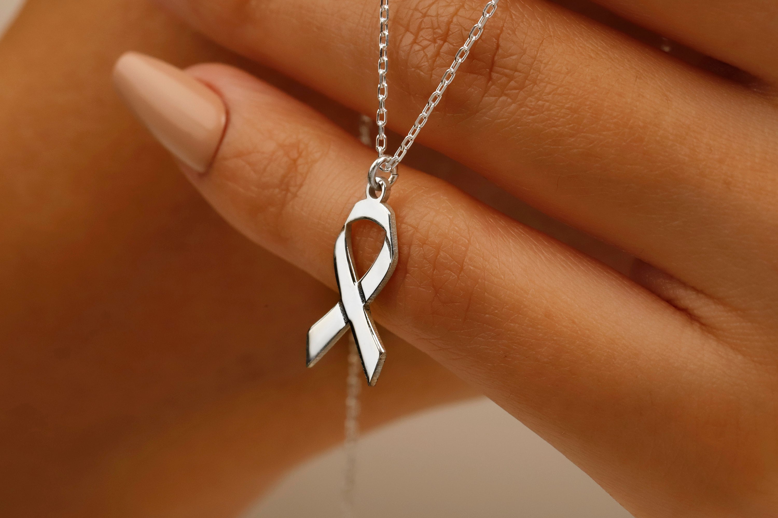 Ribbon Necklace | Elegant Symbol of Breast Cancer Awareness