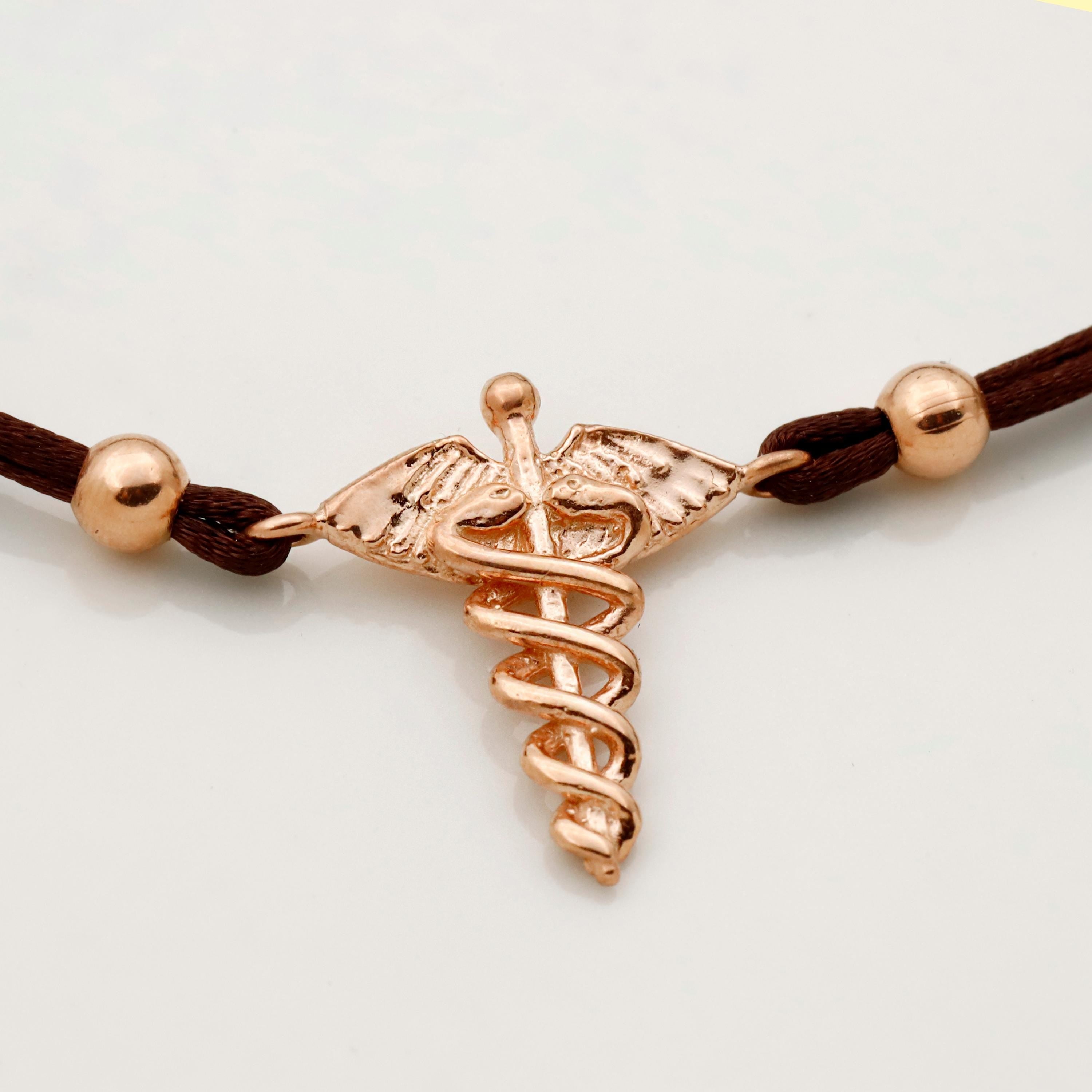 Nurse's Pride Sterling Silver Caduceus Bracelet - A Tribute to Compassionate Care