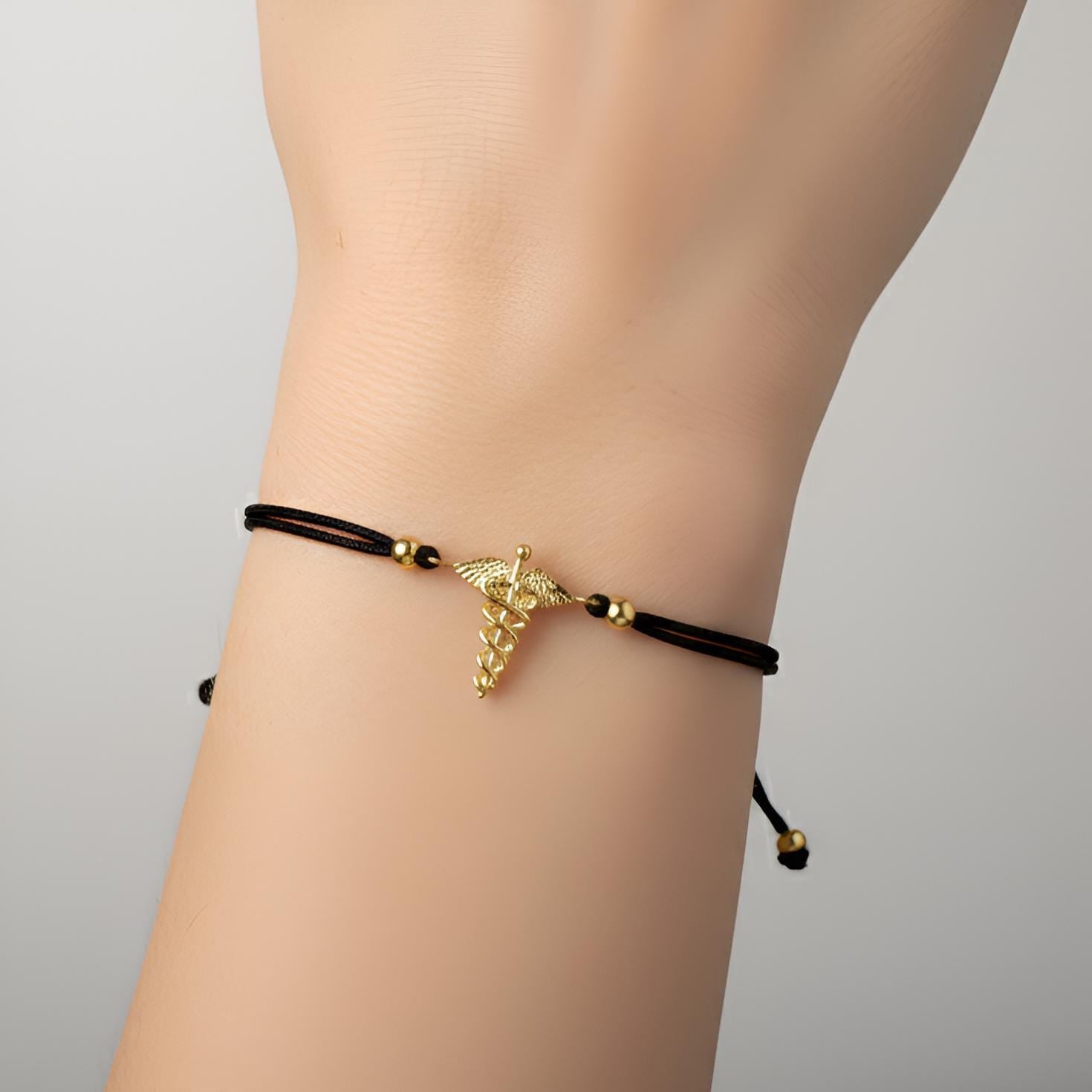 Nurse's Pride Sterling Silver Caduceus Bracelet - A Tribute to Compassionate Care